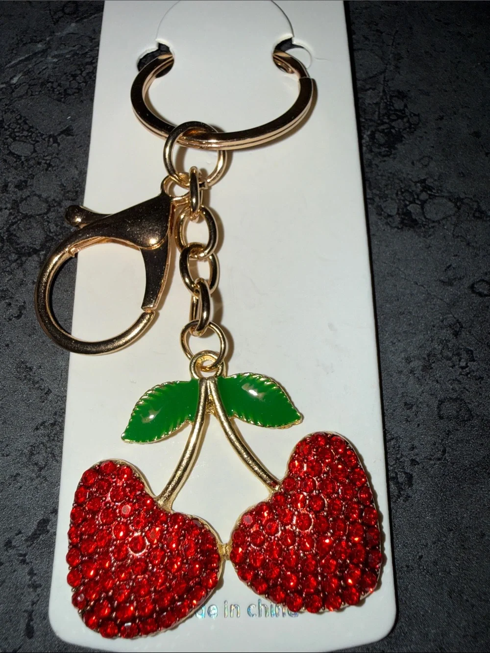 Gold-Tone Red Crystal Cherry Keychain with Green Enamel Leaves